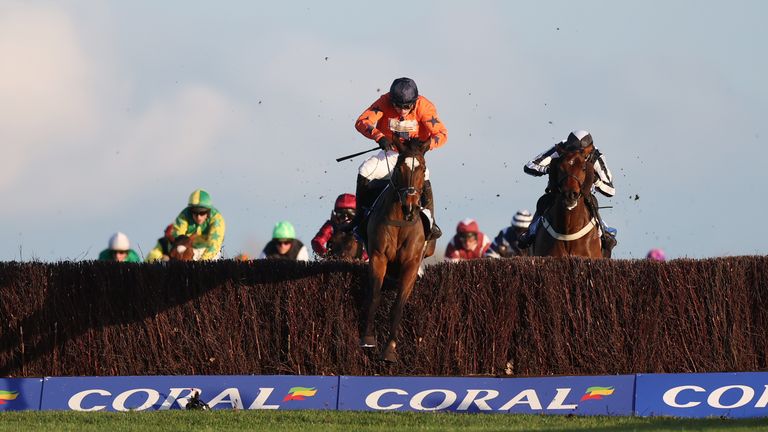 Panic Attack ridden by Tristan Durrell on their way to winning the Coral Gold Cup Handicap Chase during the Coral Gold Cup Day at Newbury