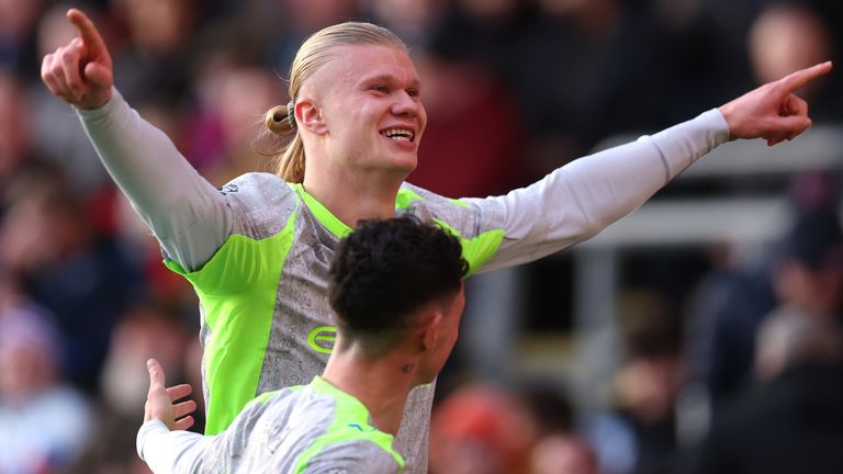 Erling Haaland celebrates after heading Man City into the lead at Crystal Palace