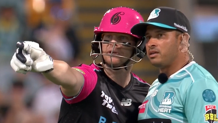 Steve Smith points to the crowd as he complains about the spectators